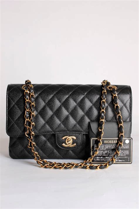 chanel 2.55 caviar black & gold bag|2.55 .